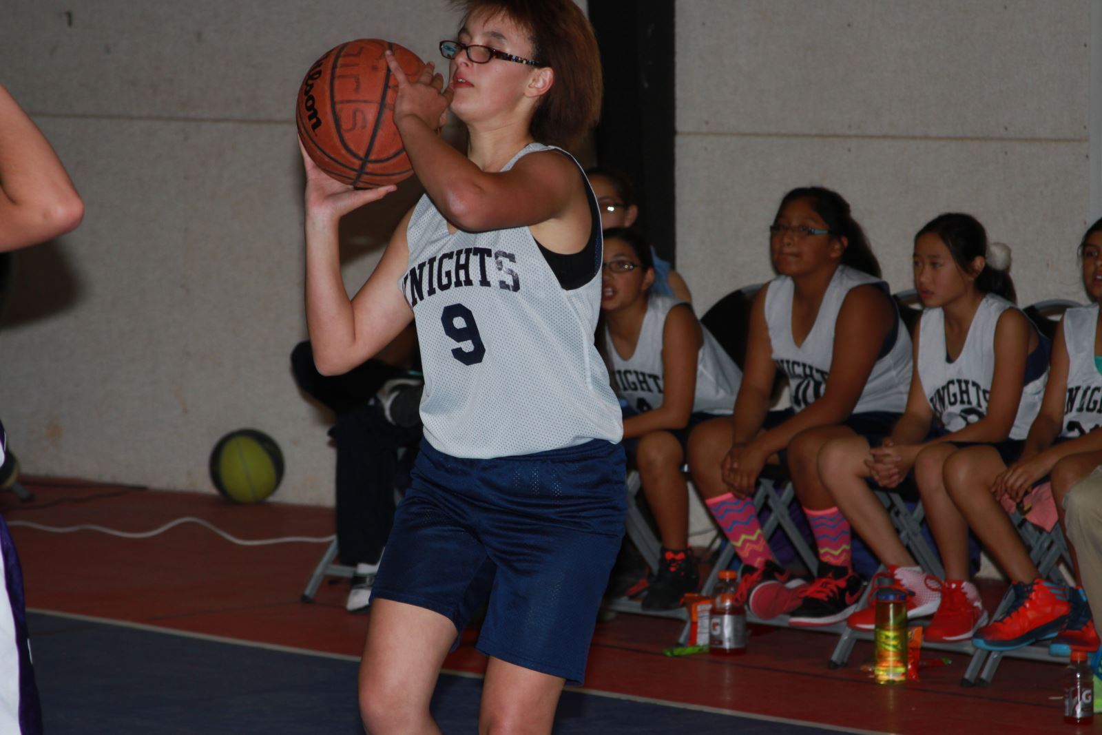 Girl playing basketball